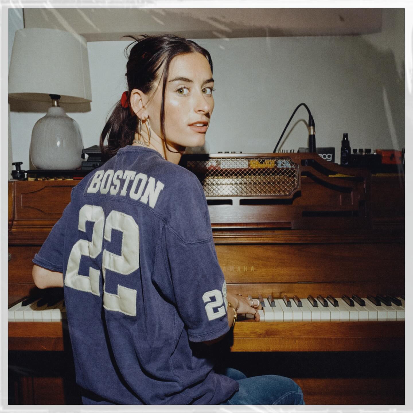 A woman playing a piano