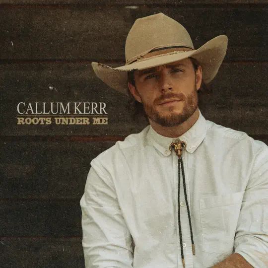 A man in a cowboy hat