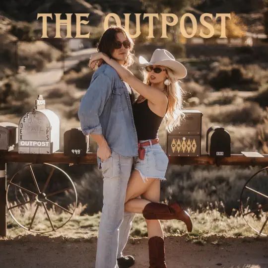 A man and woman posing for a picture